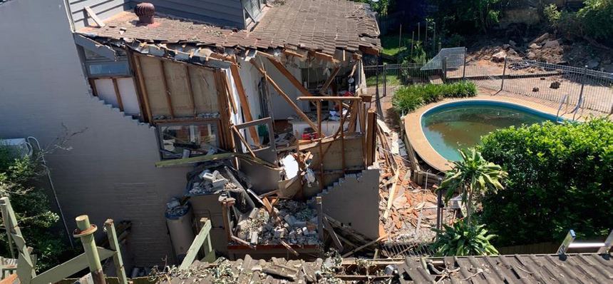 Storm damaged home before reinstatement